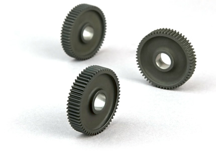 three identical gears, with a grayish-black hue, placed against a white background, which provides a stark contrast and emphasizes the items. Each gear has a central hole, likely for mounting onto an axle or shaft. The gears appear to be made from a durable material, possibly metal or a hard plastic composite. The teeth of the gears are well-defined and evenly spaced, which is essential for meshing with other gears in a machine to transmit torque and motion effectively. This kind of precision gear is commonly used in various machinery and mechanisms where exact motion control is crucial. The meticulous crafting and smooth finish indicate high-quality manufacturing standards.